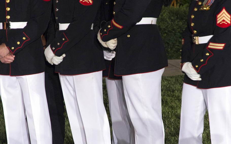 Obamas attend evening parade at Marine Barracks Washington Stars